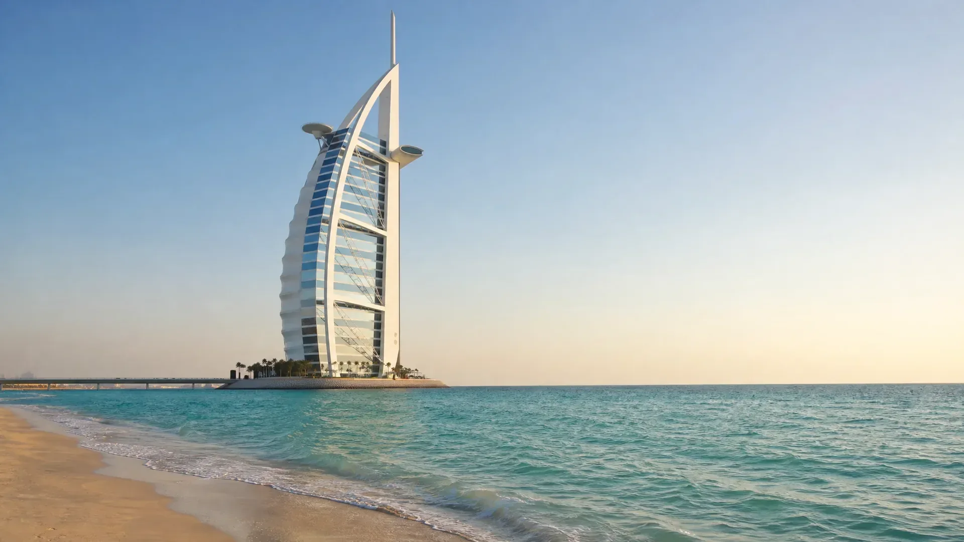The sail-shaped Burj Al Arab on its island, seen from the beach (AI-generated image)